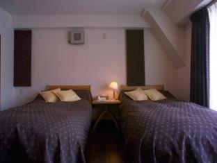 Aparthotel Tabiyu Abrigo Kōbe Habitación foto