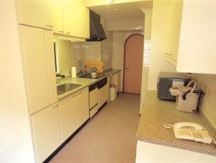 Aparthotel Tabiyu Abrigo Kōbe Habitación foto