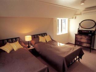 Aparthotel Tabiyu Abrigo Kōbe Habitación foto